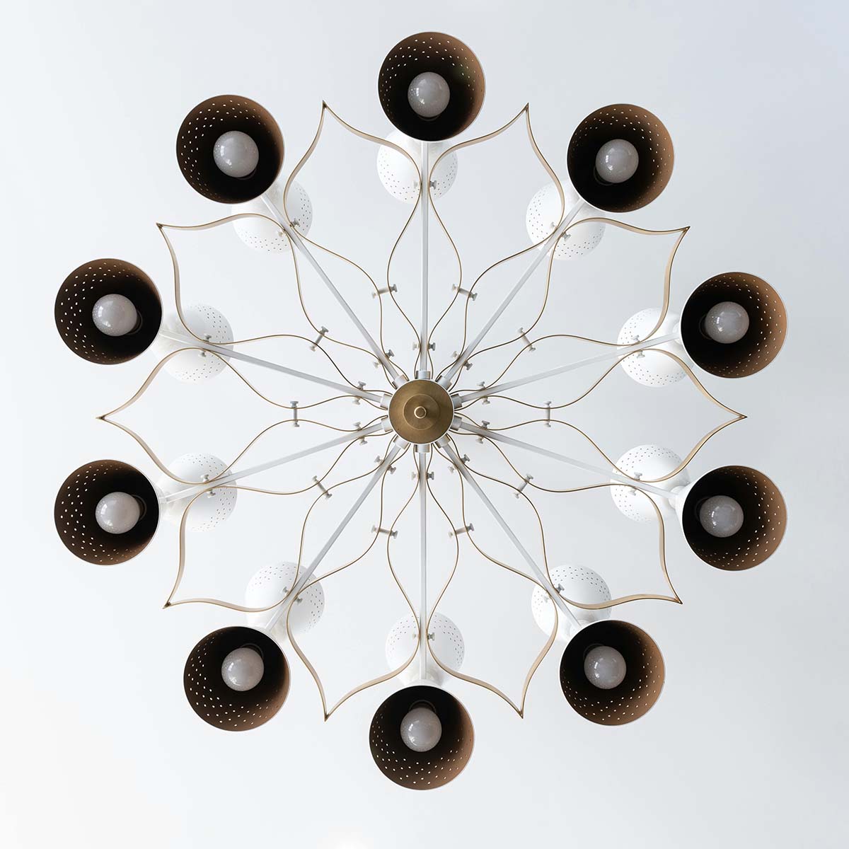 grey stone bathroom wall with circular mirror