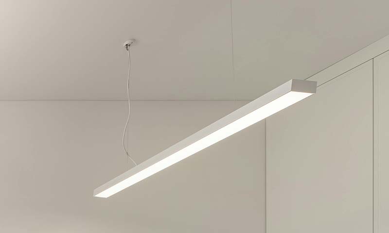 stock image of a downlight rectangular in front of white walls