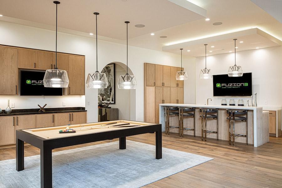 An entertainment room with in-ceiling hidden speakers.